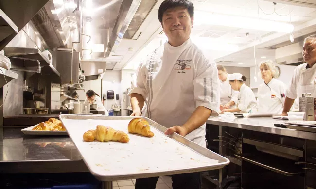Chef Peter Yuen teaches his viennoisserie techniques to ICE students.