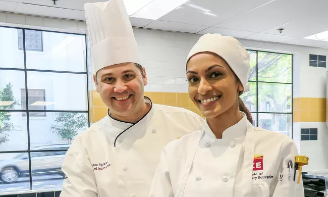 An ICE student and an ICE culinary instructor 