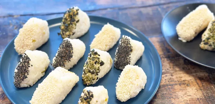 Ten Fermented Seven Spice Mango Onigiri rice balls sit on a blue plate