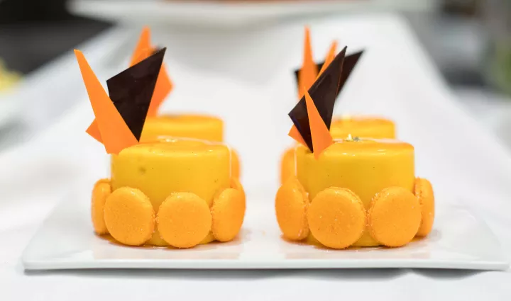 Orange entremets made in Diego Lozano's pastry workshop at the Institute of Culinary Education