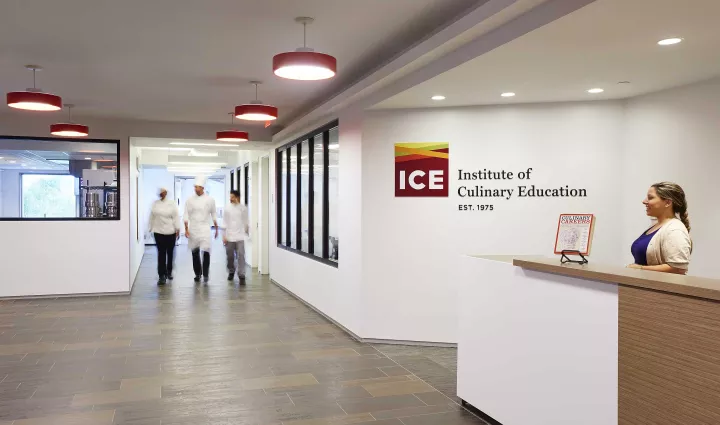 ICE students walk through the lobby at the Institute of Culinary Education's New York campus