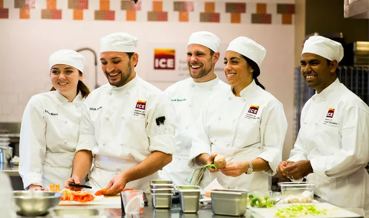 ICE culinary arts students grouped together in class at the Institute of Culinary Education